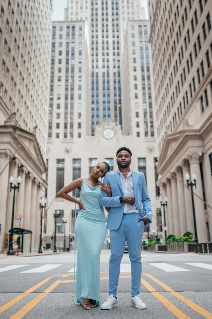 Couple Posing near Old City Buildings.