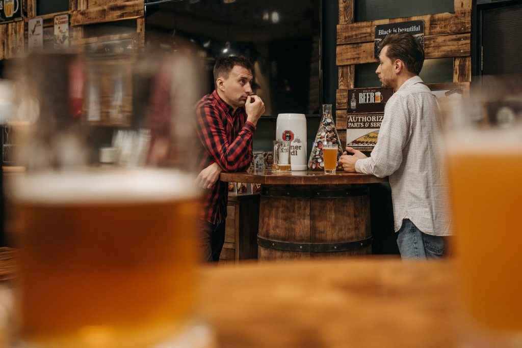 Men Hanging Out at a Bar.